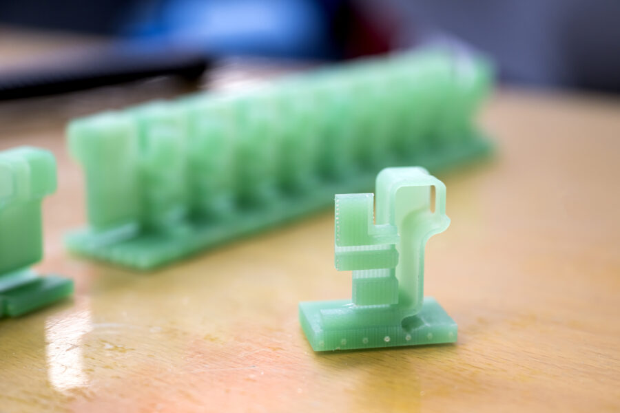 Groen kunststof onderdeel